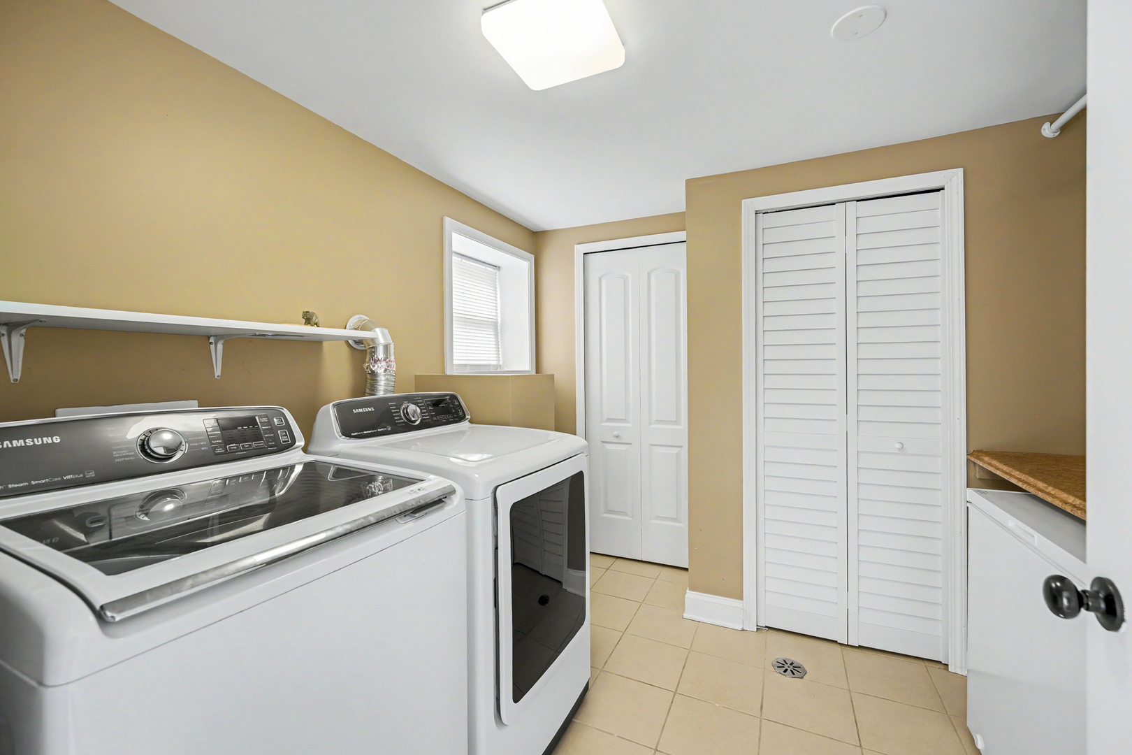 3S171 Arboretum Road Glen Ellyn, IL 60137 - Photo 26 of 41 a utility room with dryer and washer