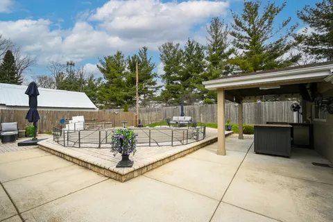 a view of pool with outdoor seating