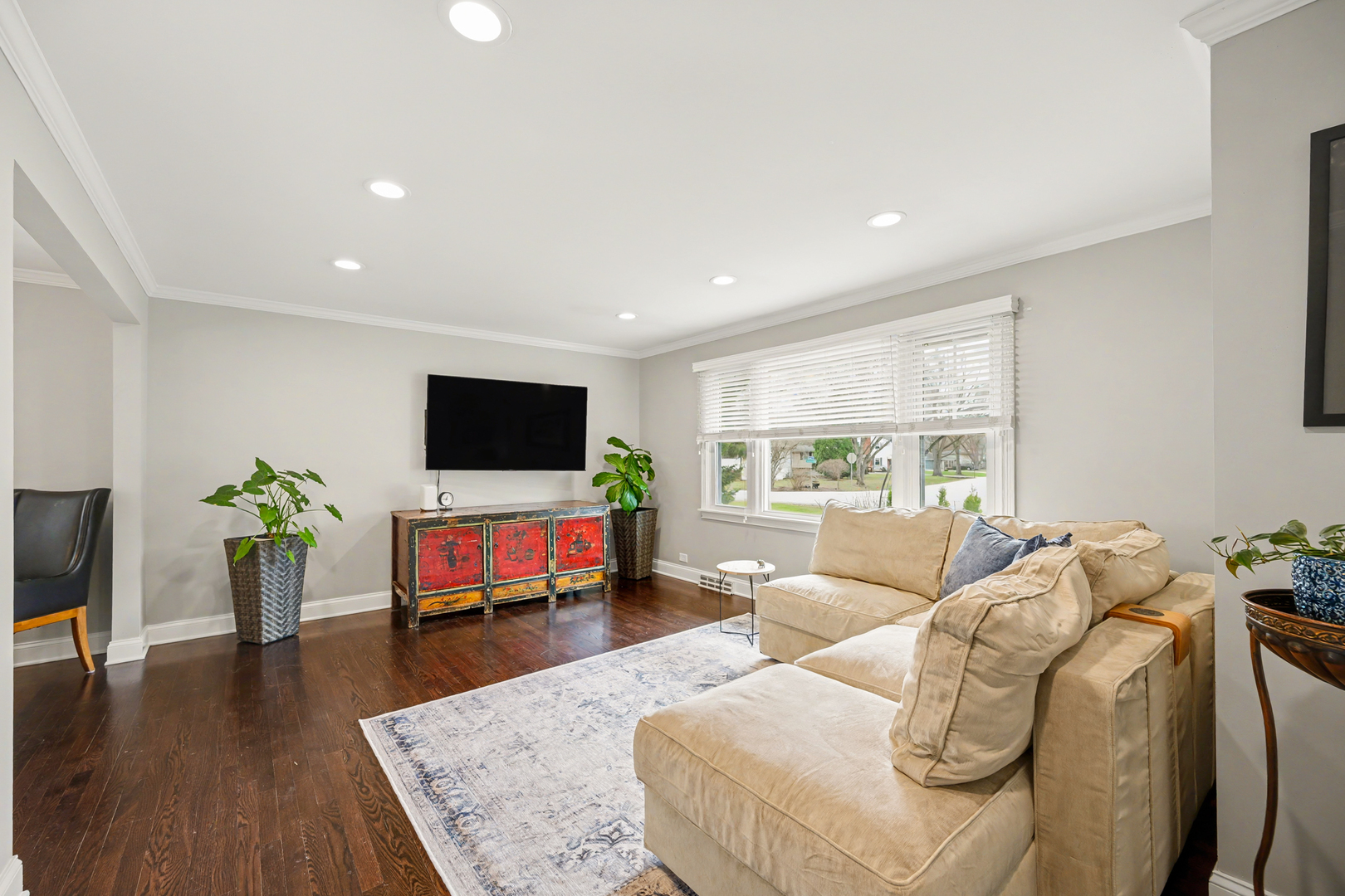 3S171 Arboretum Road Glen Ellyn, IL 60137 - Photo 3 of 41 a living room with furniture and a flat screen tv
