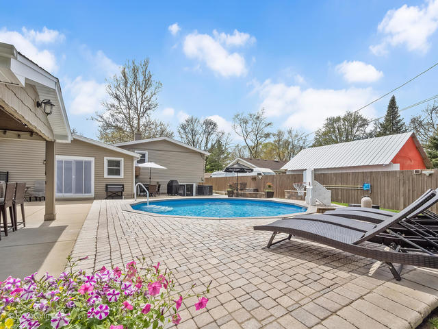 3S171 Arboretum Road Glen Ellyn, IL 60137 - Photo 35 of 41 a view of house with backyard and sitting area