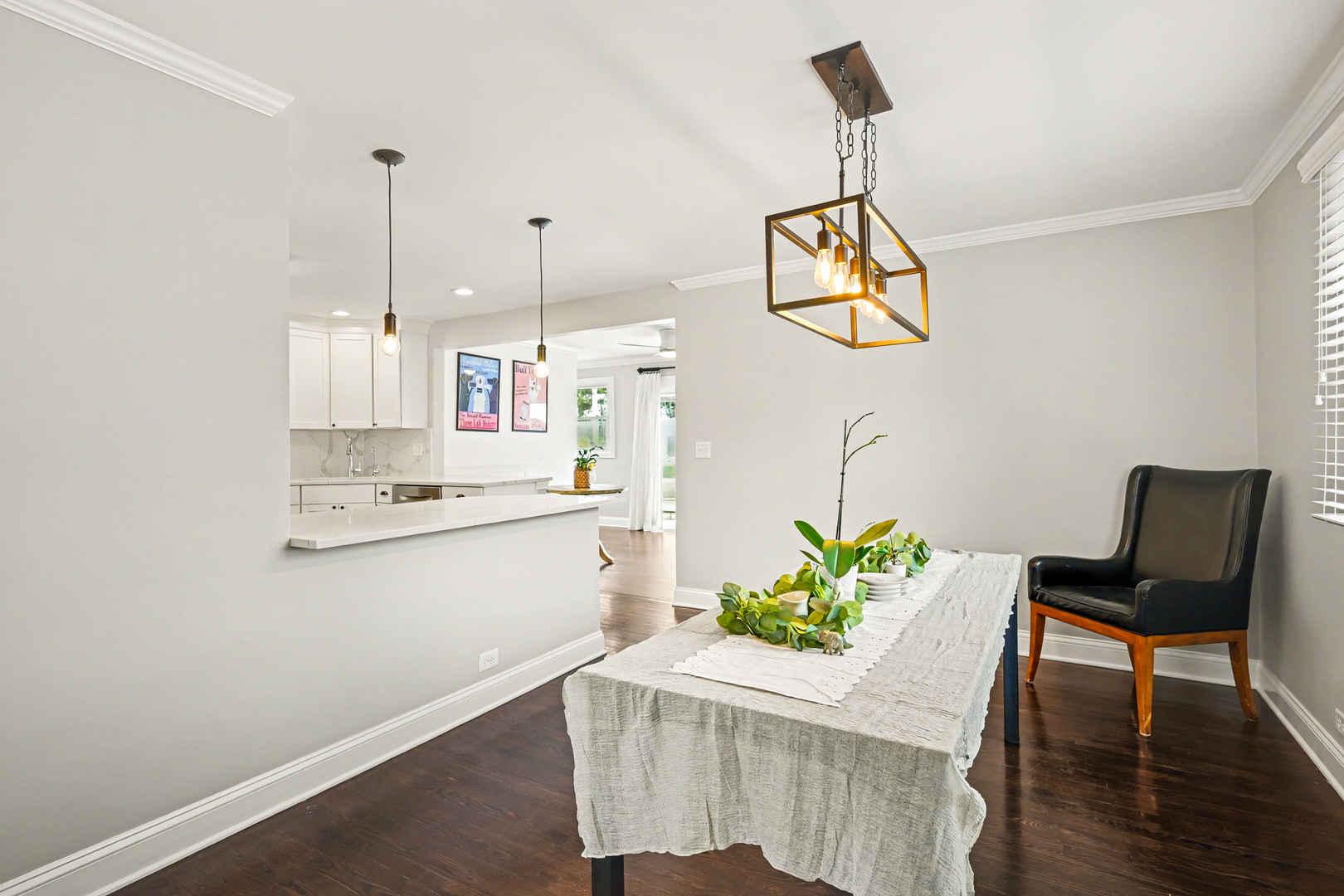 3S171 Arboretum Road Glen Ellyn, IL 60137 - Photo 7 of 41 a white kitchen with a window and a potted plant