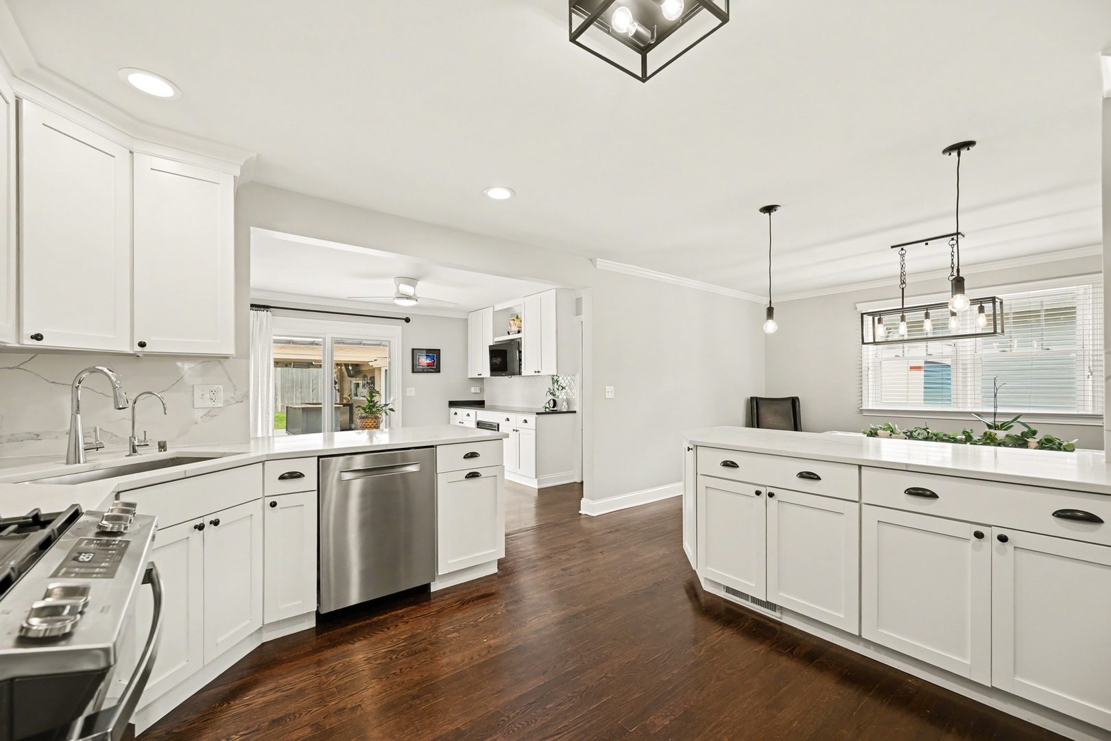 3S171 Arboretum Road Glen Ellyn, IL 60137 - Photo 10 of 41 a kitchen with white cabinets sink and stainless steel appliances
