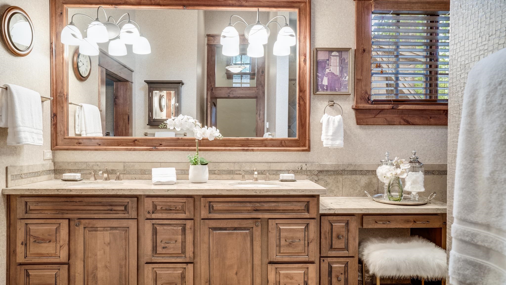 8602 Lloyd Tevis Drive Truckee, CA 96161 - Photo 14 of 21 a bathroom with a sink and a mirror