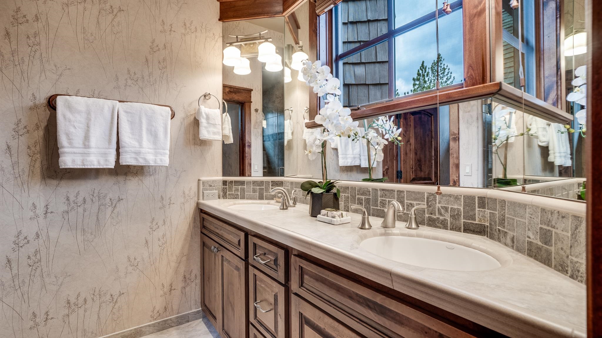 8602 Lloyd Tevis Drive Truckee, CA 96161 - Photo 17 of 21 a bathroom with a double vanity sink and a mirror