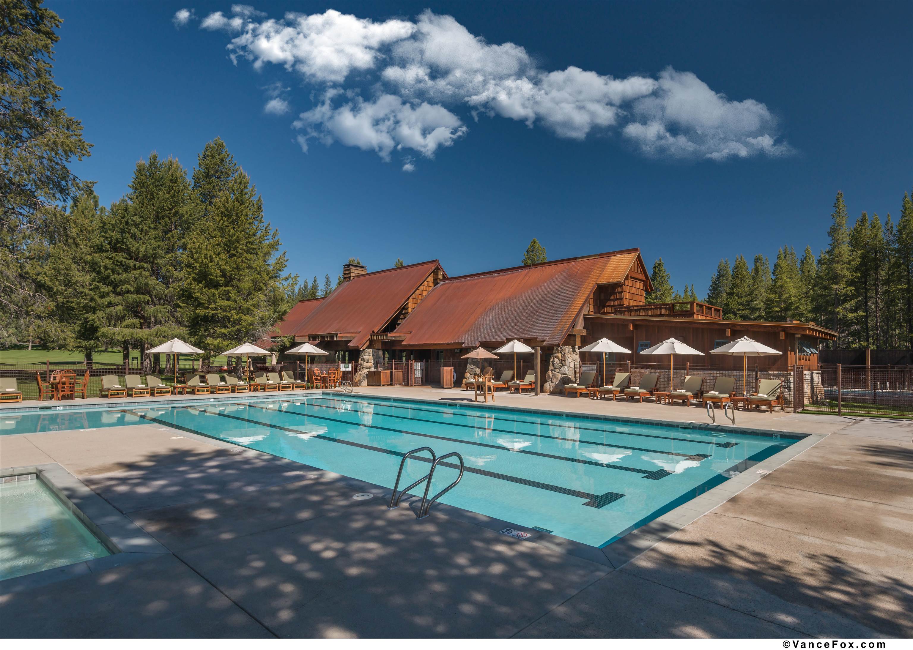 8602 Lloyd Tevis Drive Truckee, CA 96161 - Photo 20 of 21 a view of a house with backyard and sitting area