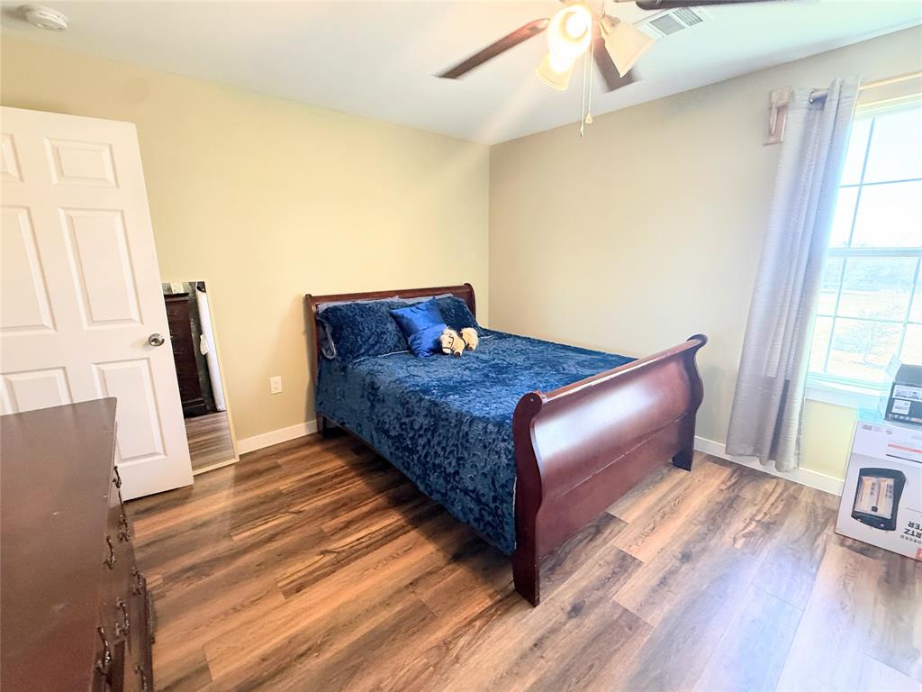 7838 Fm 937 Thornton, TX 76687 - Photo 16 of 30 a living room with furniture and a wooden floor
