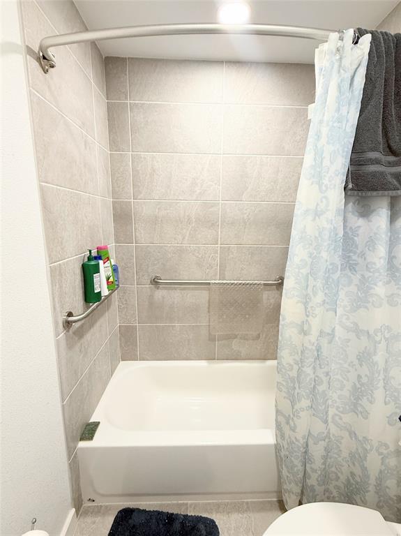 7838 Fm 937 Thornton, TX 76687 - Photo 18 of 30 a bathroom with a bathtub and a shower
