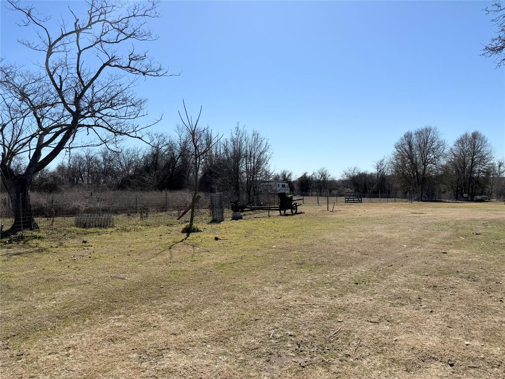 7838 Fm 937 Thornton, TX 76687 - Photo 26 of 30 a view of outdoor space with swimming pool and trees