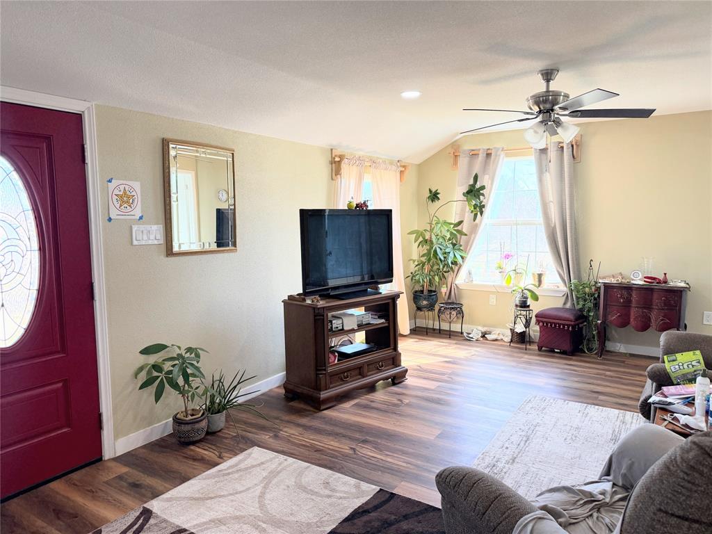 7838 Fm 937 Thornton, TX 76687 - Photo 6 of 30 a living room with furniture and a flat screen tv