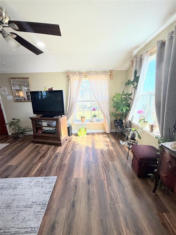 7838 Fm 937 Thornton, TX 76687 - Photo 7 of 30 a view of a livingroom with furniture hardwood floor and a window