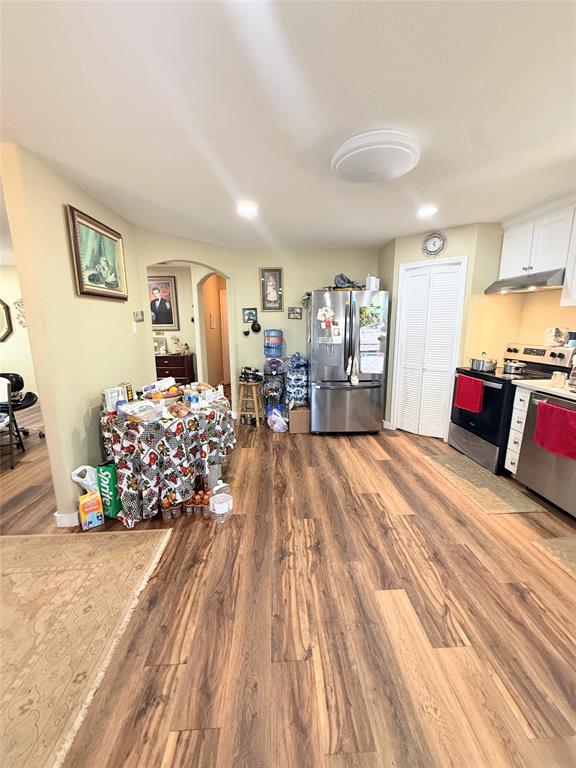 7838 Fm 937 Thornton, TX 76687 - Photo 9 of 30 a spacious bedroom with a bed and a large mirror
