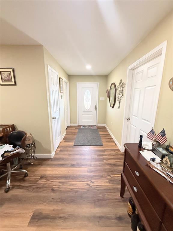 7838 Fm 937 Thornton, TX 76687 - Photo 10 of 30 a bedroom with a bed and wooden floor