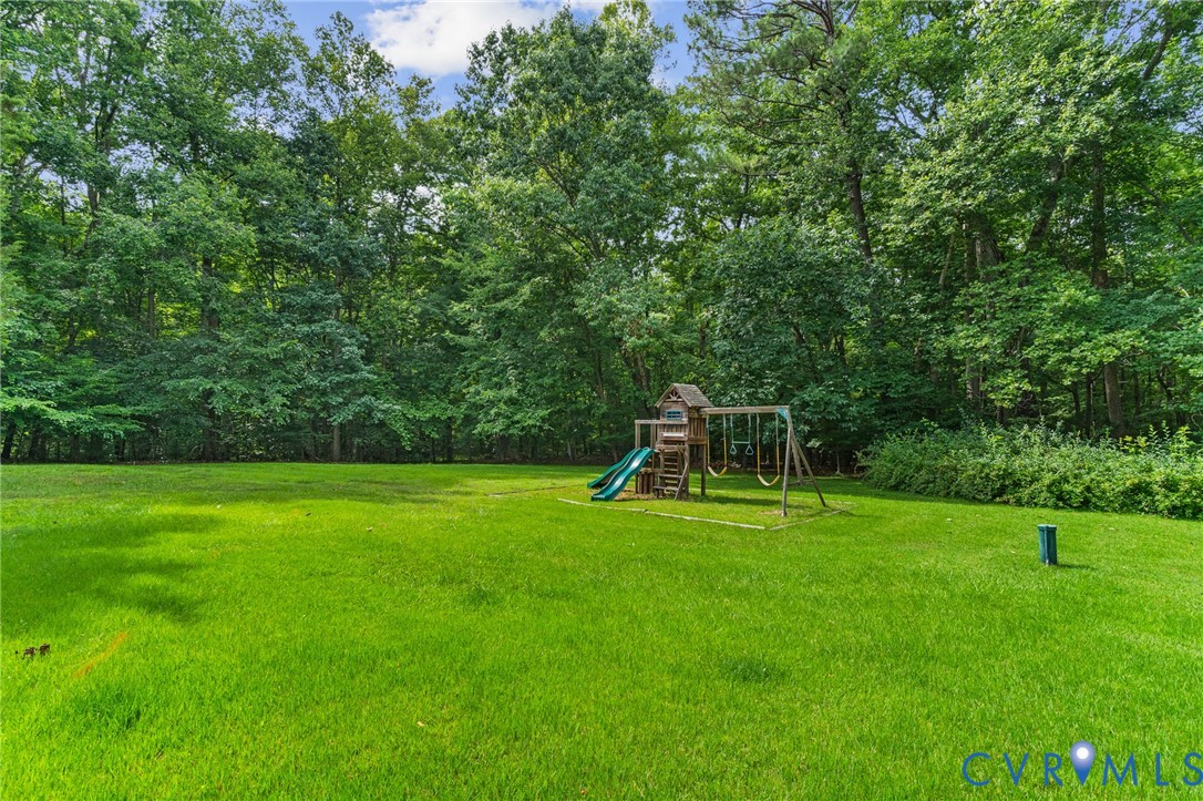 9400 Morley Road Midlothian, VA 23112 - Photo 29 of 38 Beautiful large back yard is ideal for kids and pe
