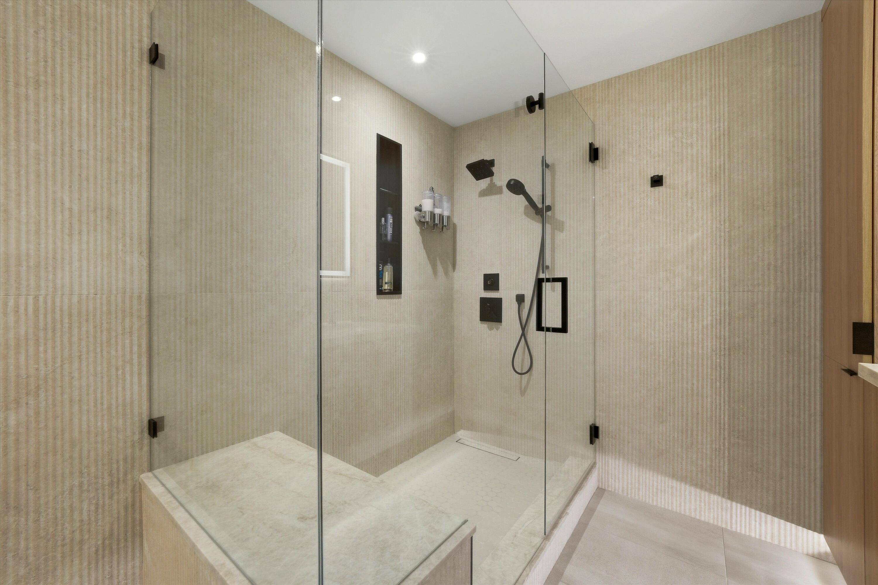 910 Island Drive, Unit 110 Rancho Mirage, CA 92270 - Photo 22 of 30 a bathroom with a shower