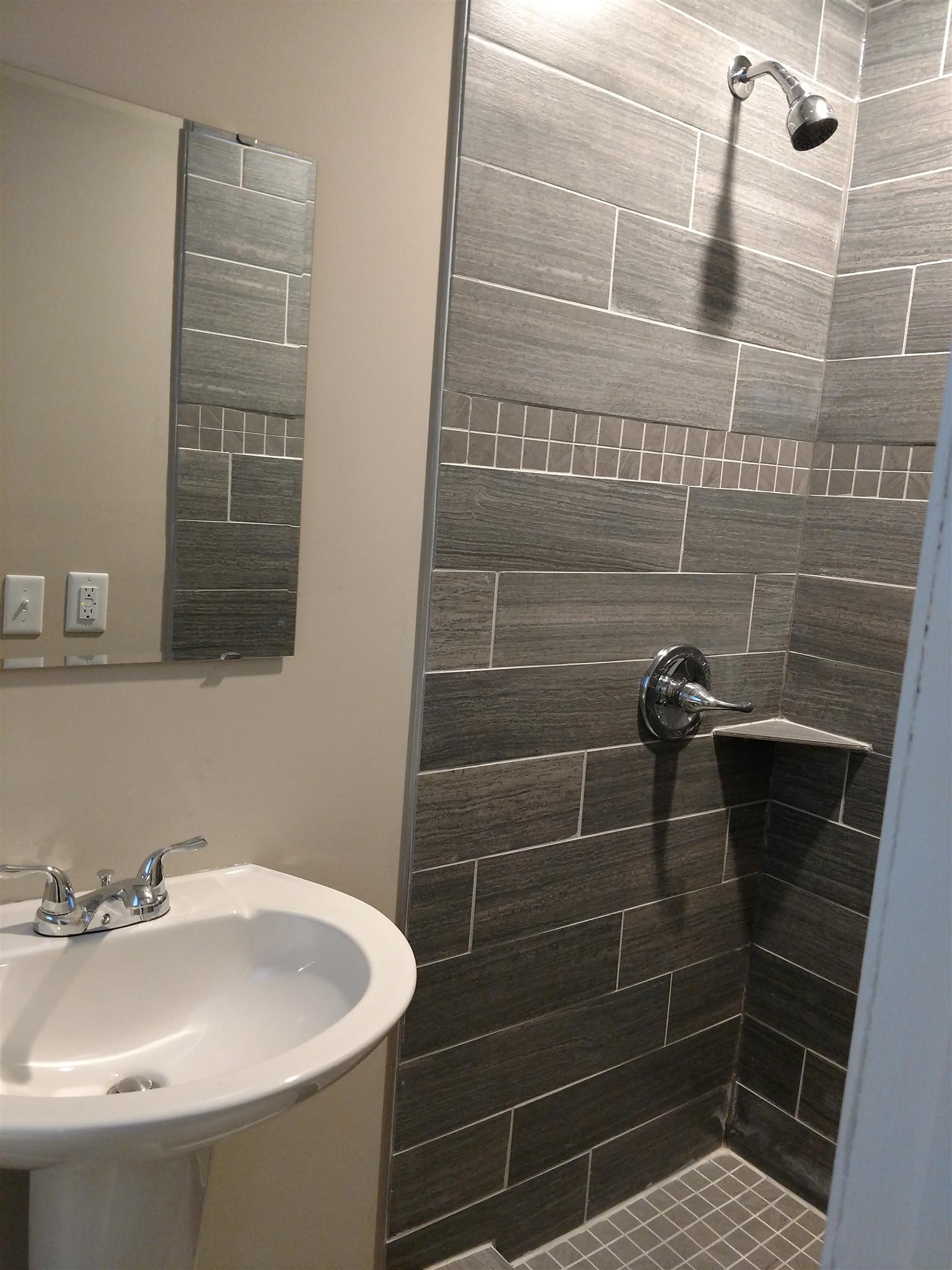 308 Notgrass Road Clarksville, TN 37042 - Photo 11 of 19 a bathroom with a sink toilet and shower