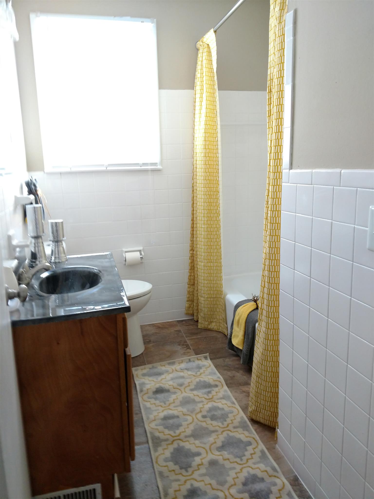 308 Notgrass Road Clarksville, TN 37042 - Photo 13 of 19 a bathroom with a sink and a mirror