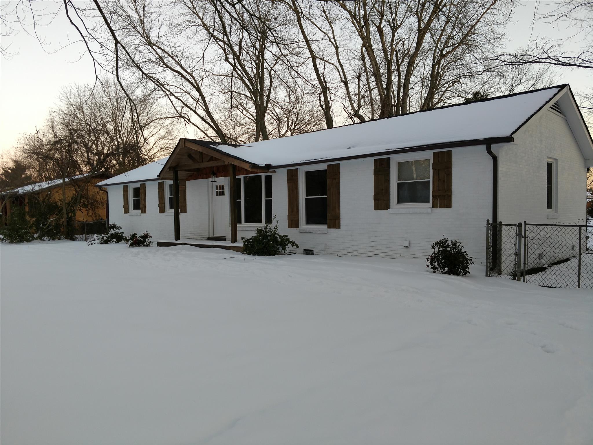 308 Notgrass Road Clarksville, TN 37042 - Photo 2 of 19 a front view of a house with a yard