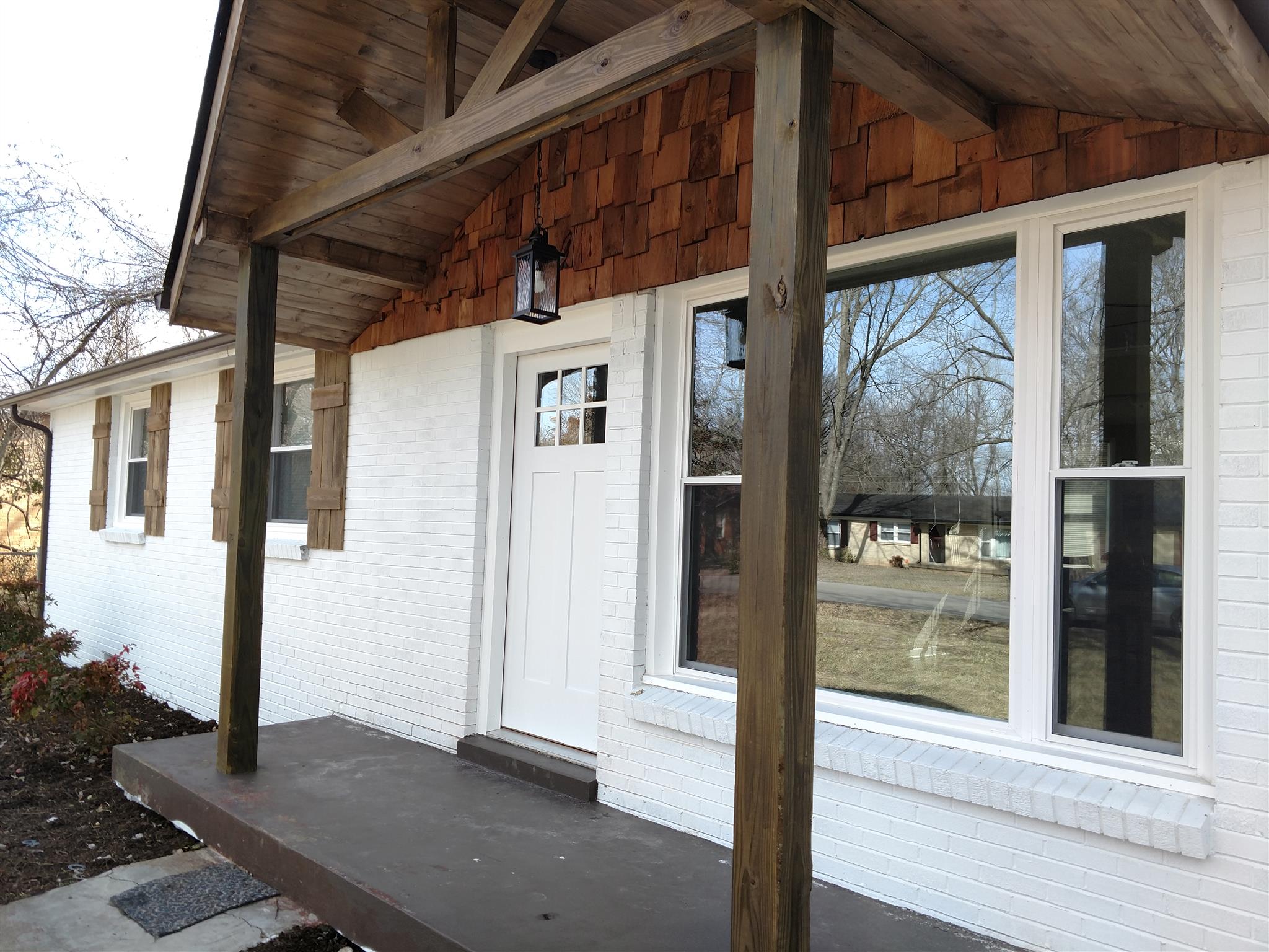 308 Notgrass Road Clarksville, TN 37042 - Photo 3 of 19 a view of a porch with a table and chairs