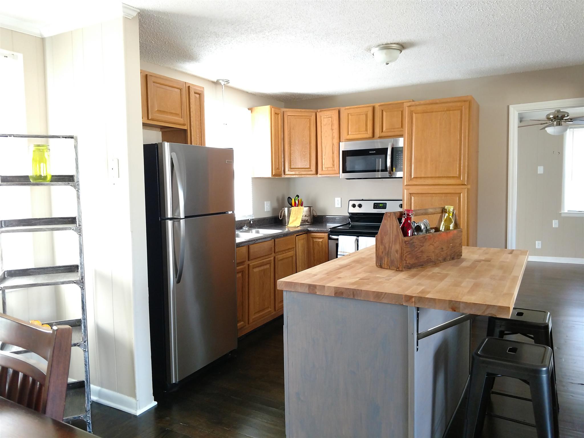 308 Notgrass Road Clarksville, TN 37042 - Photo 9 of 19 a kitchen with kitchen island a refrigerator stove microwave and sink