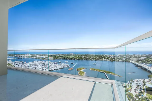 a view of a balcony with an ocean