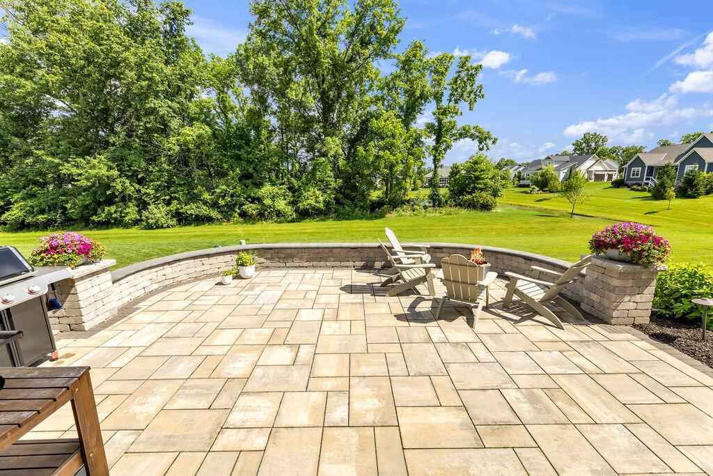 4655 Speranza Loop Galena, OH 43021 - Photo 54 of 61 Professionally designed hardscape overlooks the pond, mature trees and green space
