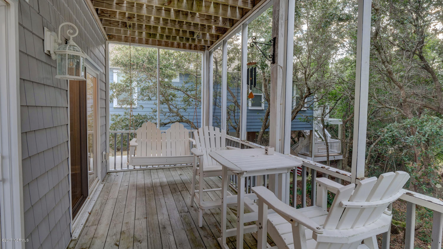 111 Atkinson Road Surf City, NC 28445 - Photo 12 of 29 Deck complete with porch swing