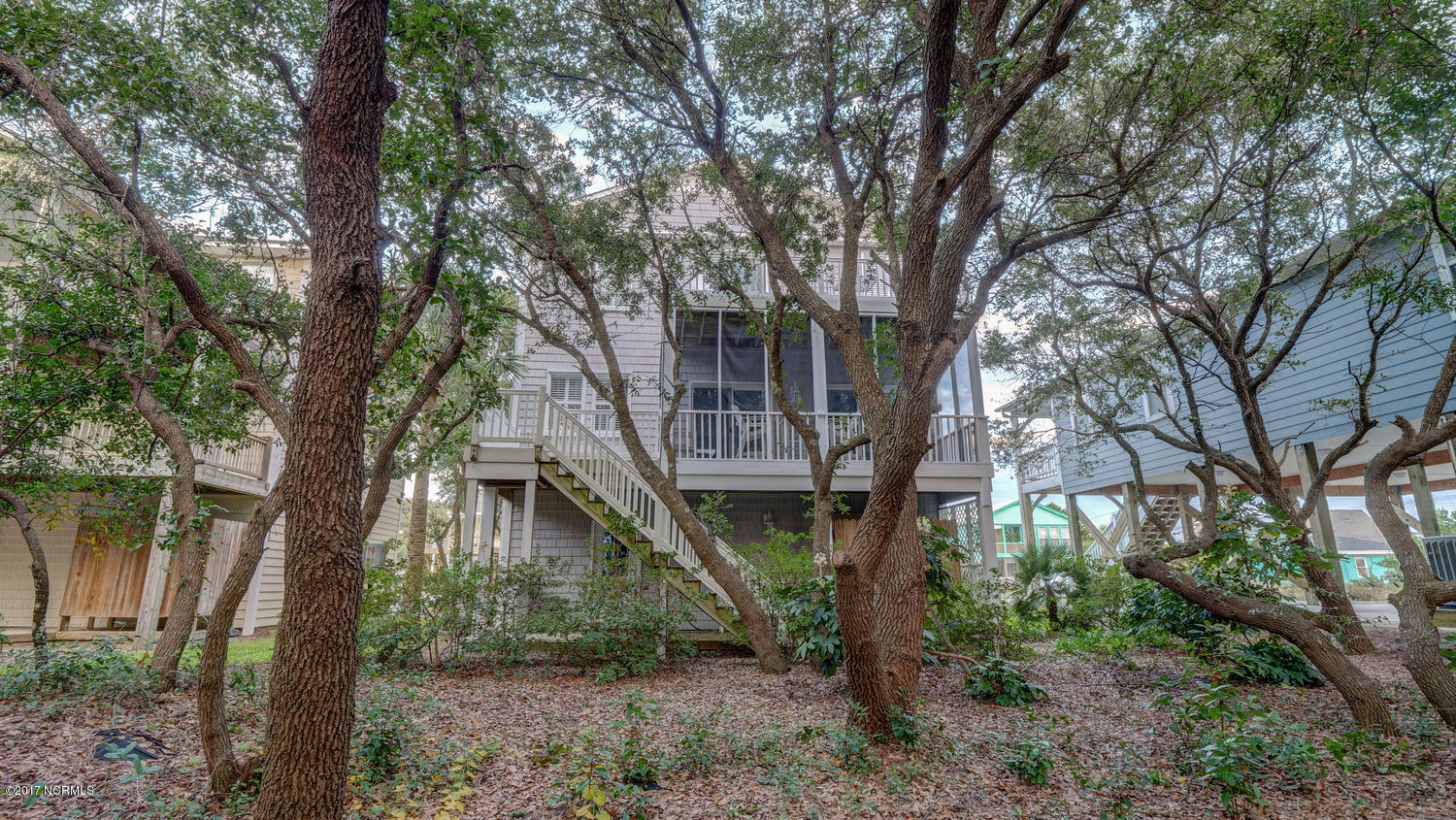 111 Atkinson Road Surf City, NC 28445 - Photo 28 of 29 beautiful trees on lot