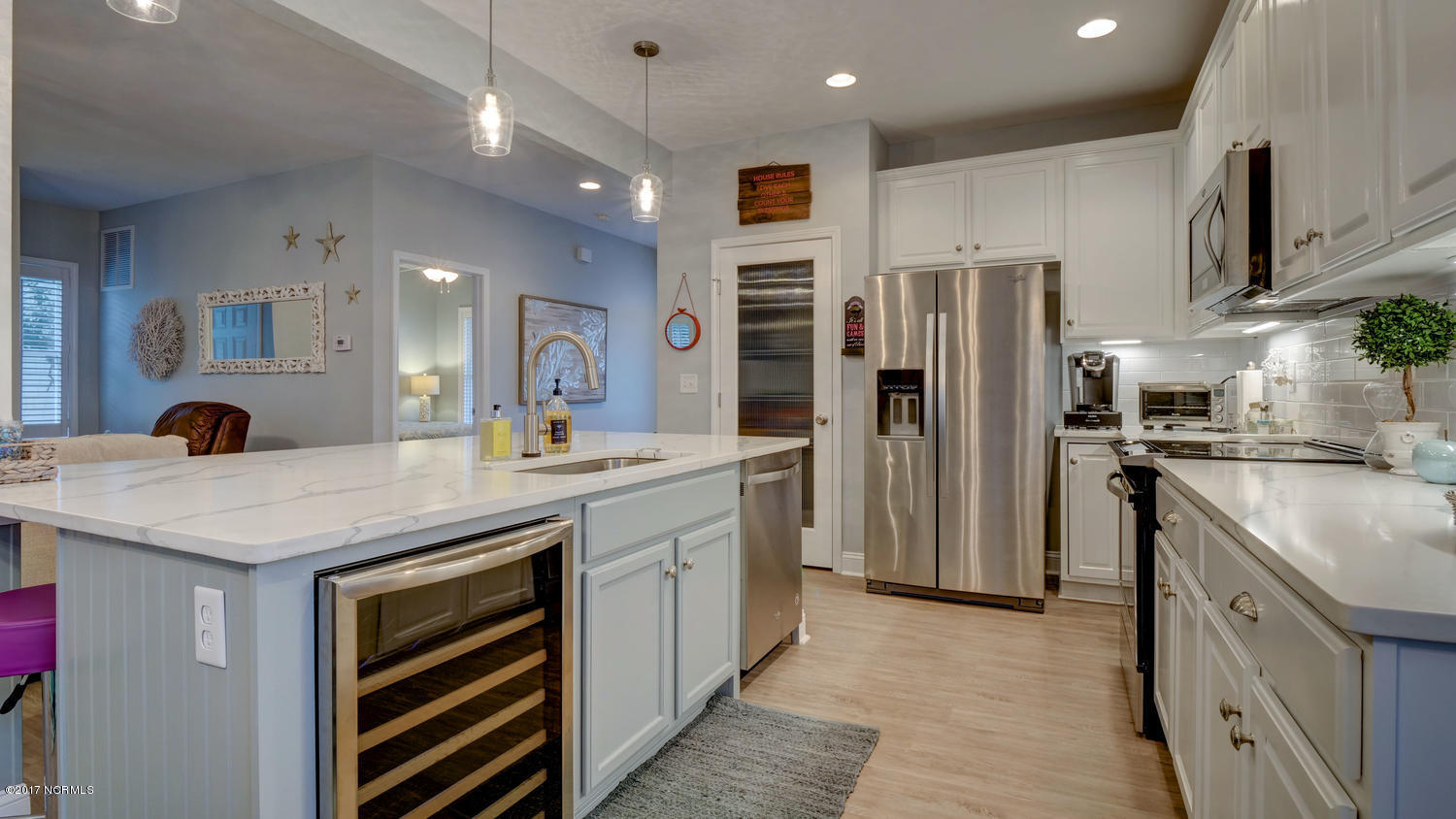 111 Atkinson Road Surf City, NC 28445 - Photo 8 of 29 SS appliances and wine cooler
