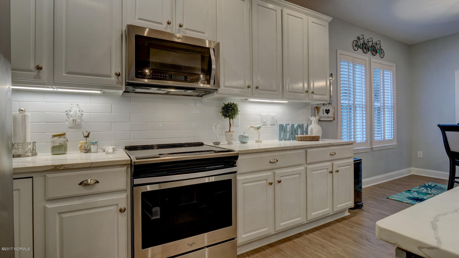 111 Atkinson Road Surf City, NC 28445 - Photo 9 of 29 Lighted subway backsplash