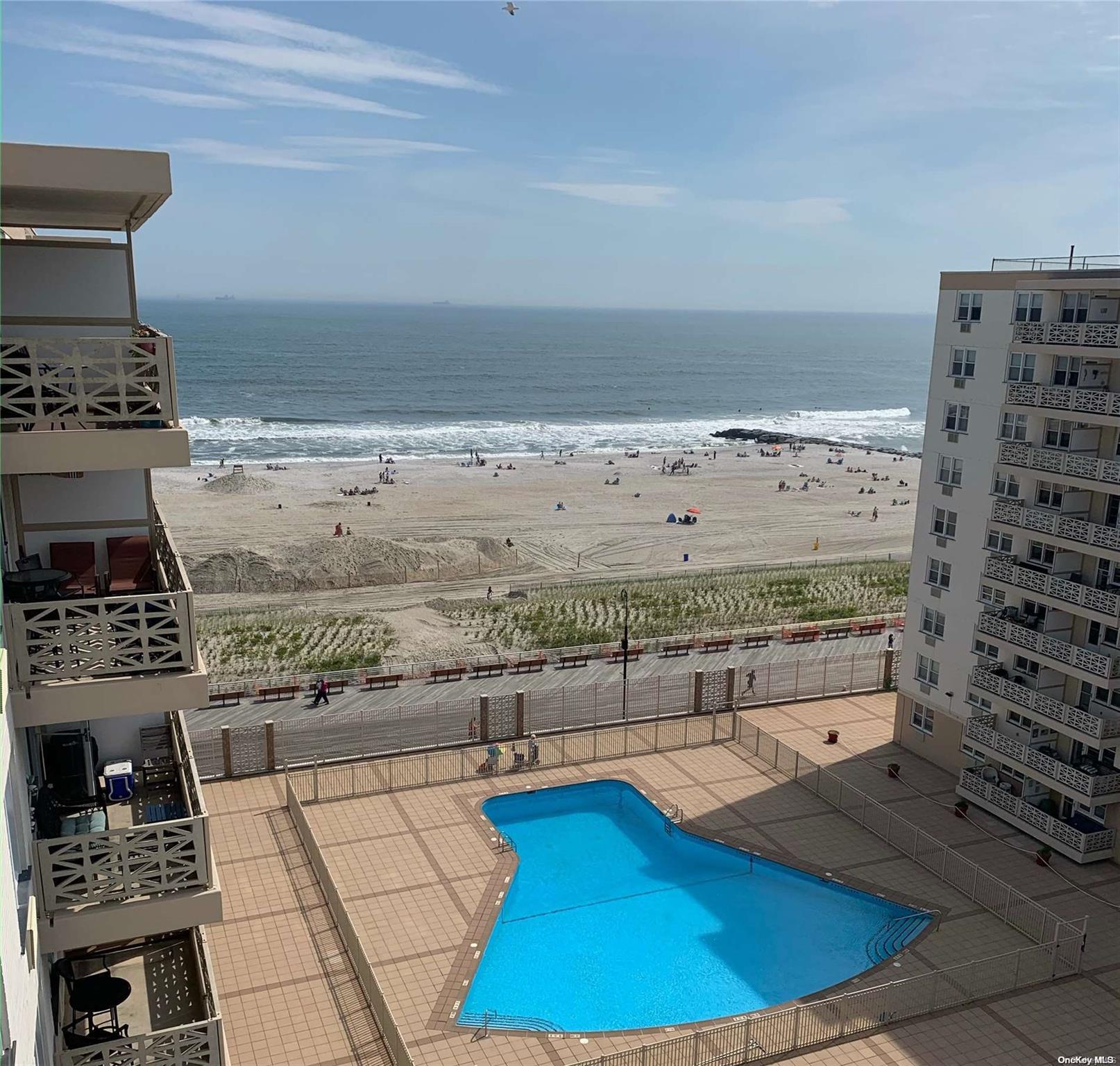 450 Shore Road, Unit 9H Long Beach, NY 11561 - Photo 1 of 1 inground heated pool