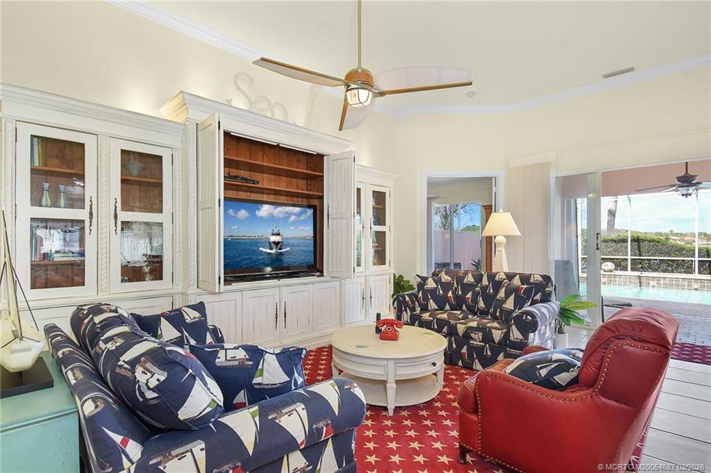 1541 Southwest Balmoral Trace Stuart, FL 34997 - Photo 12 of 52 a living room with furniture and a window