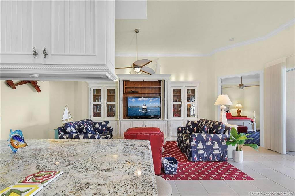 1541 Southwest Balmoral Trace Stuart, FL 34997 - Photo 24 of 52 a outdoor space with lots of furniture and chandelier
