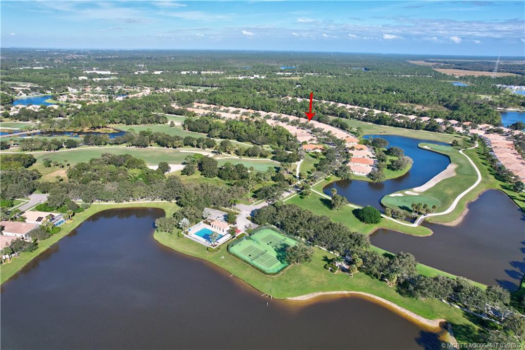 1541 Southwest Balmoral Trace Stuart, FL 34997 - Photo 50 of 52 an aerial view of a city