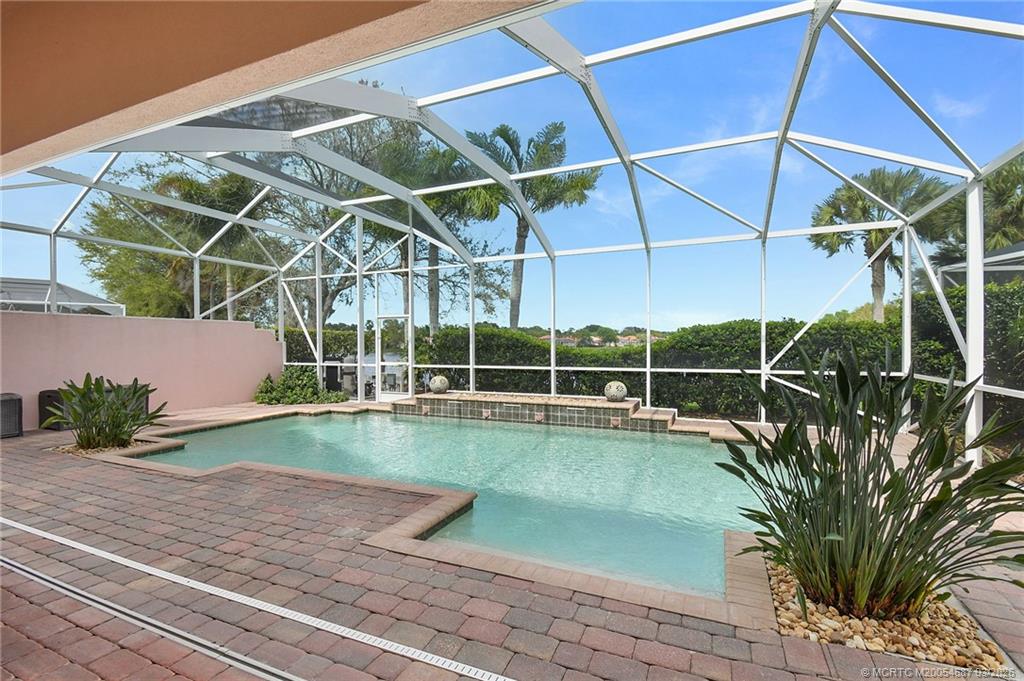1541 Southwest Balmoral Trace Stuart, FL 34997 - Photo 5 of 52 a view of a backyard