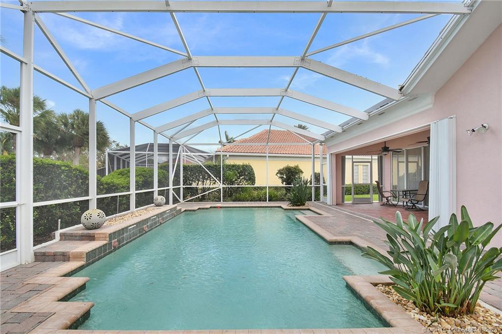 1541 Southwest Balmoral Trace Stuart, FL 34997 - Photo 8 of 52 a view of a room with window and pool table