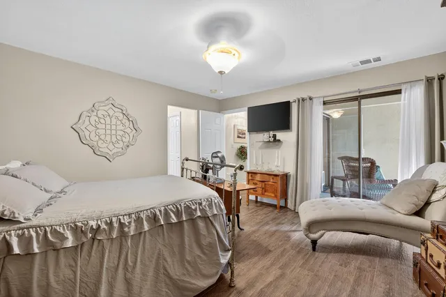 a view of bathroom with a sink and a mirror