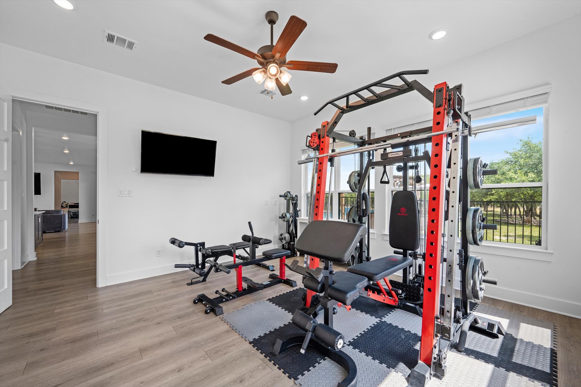 638 Strada Luca Florence, TX 76527 - Photo 23 of 38 Well-lit room, perfect for a dedicated gym space, featuring ample natural light.