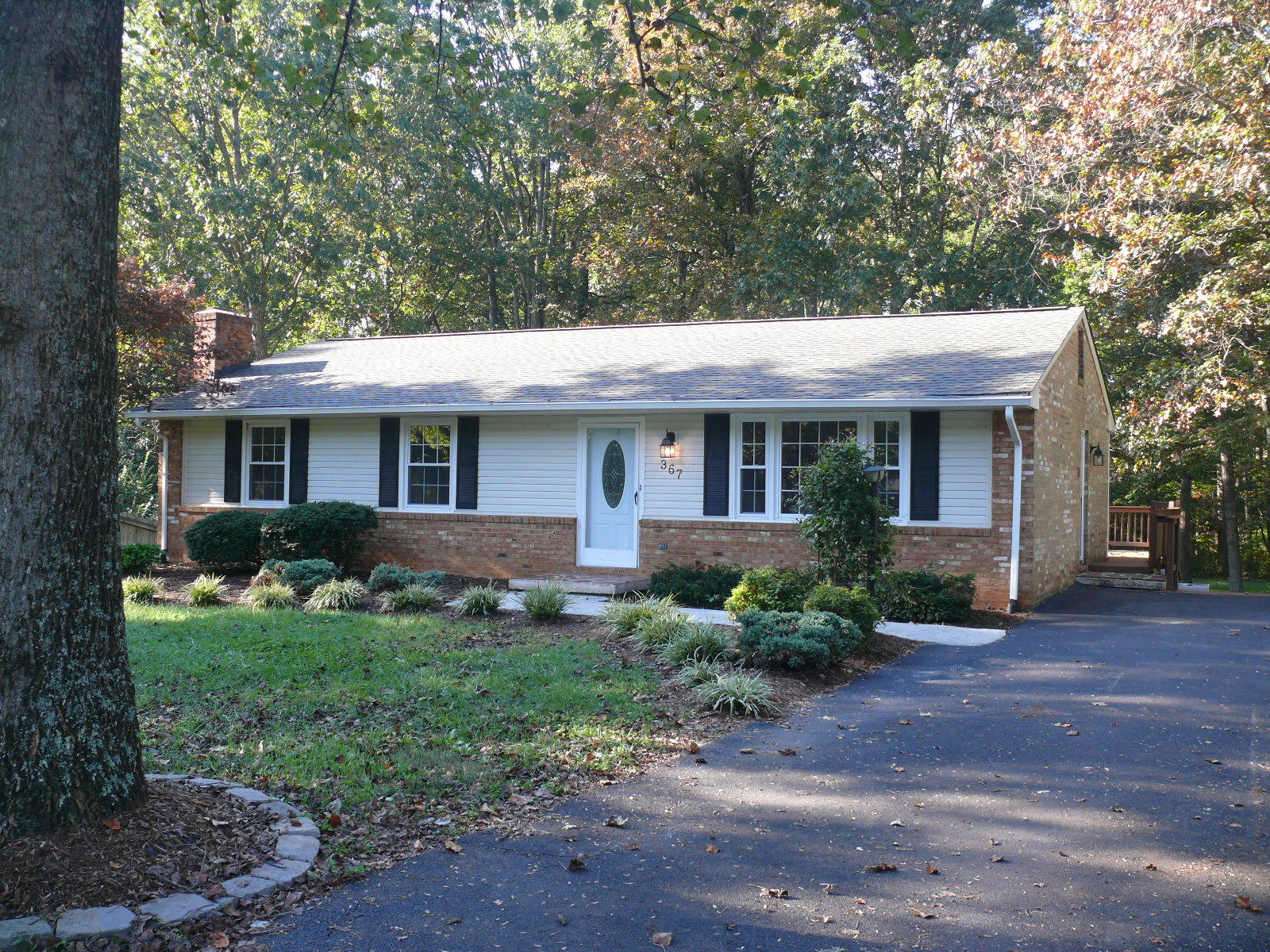 367 Scalybark Drive Blue Ridge, VA 24064 - Photo 1 of 37 a front view of a house with a yard
