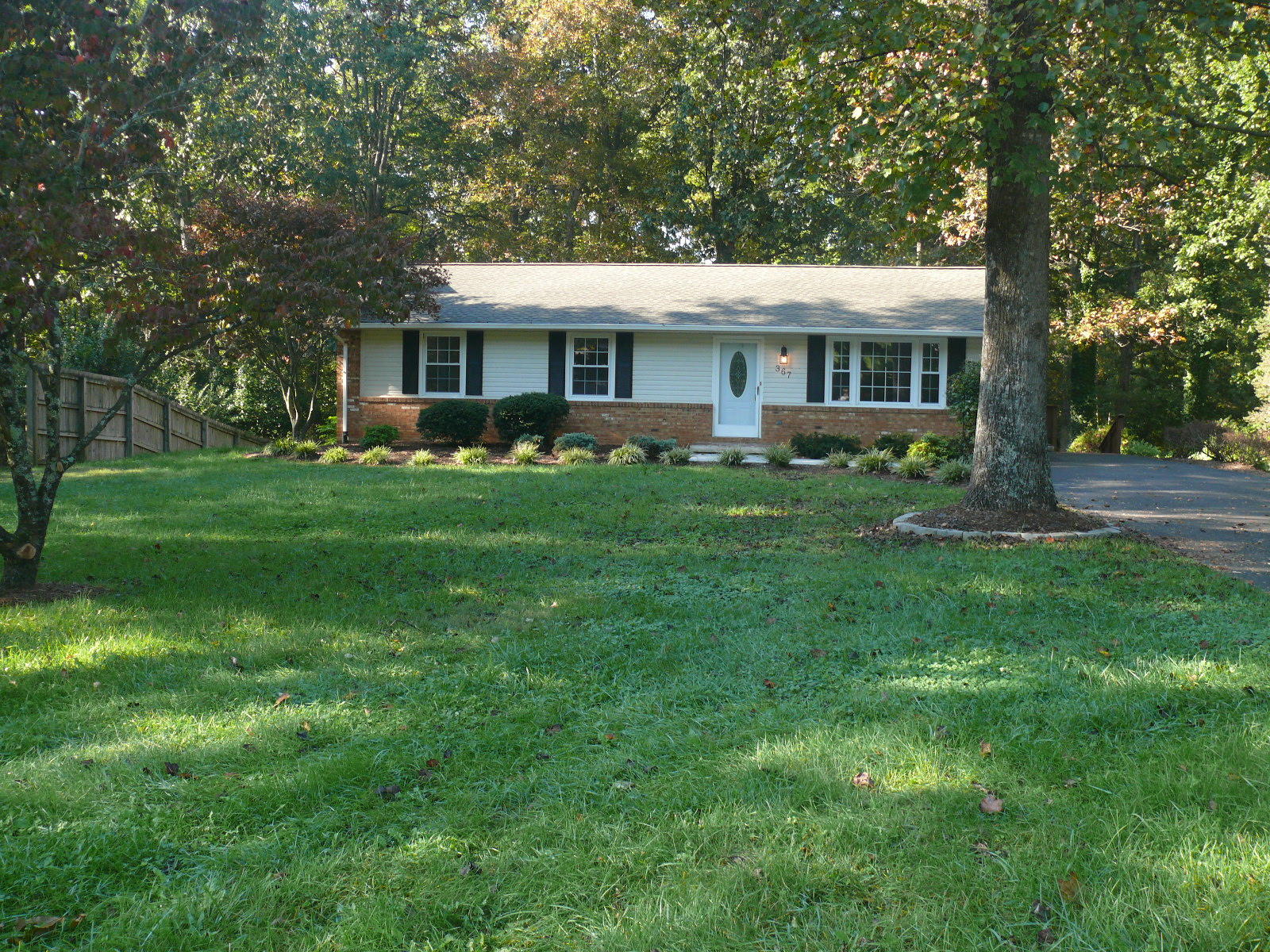 367 Scalybark Drive Blue Ridge, VA 24064 - Photo 2 of 37 a front view of a house with a garden