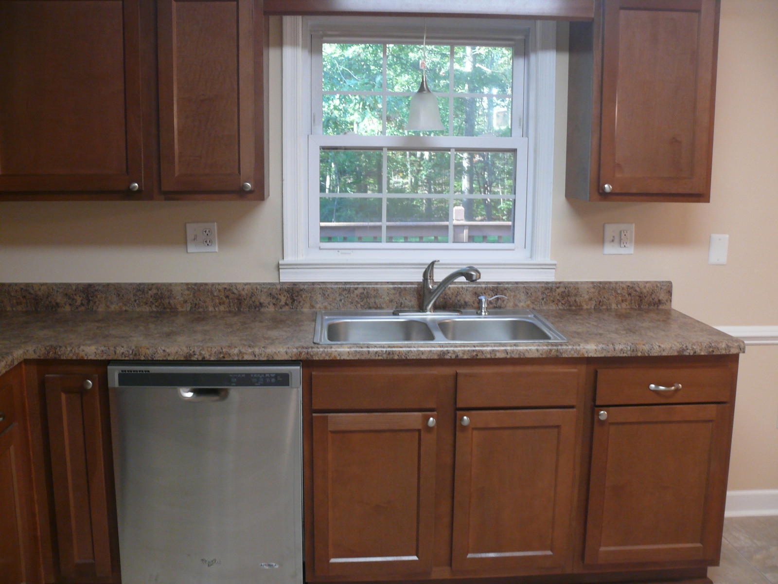 367 Scalybark Drive Blue Ridge, VA 24064 - Photo 11 of 37 a kitchen with granite countertop cabinets sink and window