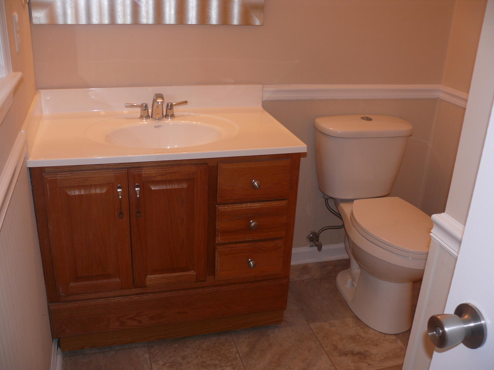 367 Scalybark Drive Blue Ridge, VA 24064 - Photo 20 of 37 a bathroom with a sink a toilet and a mirror