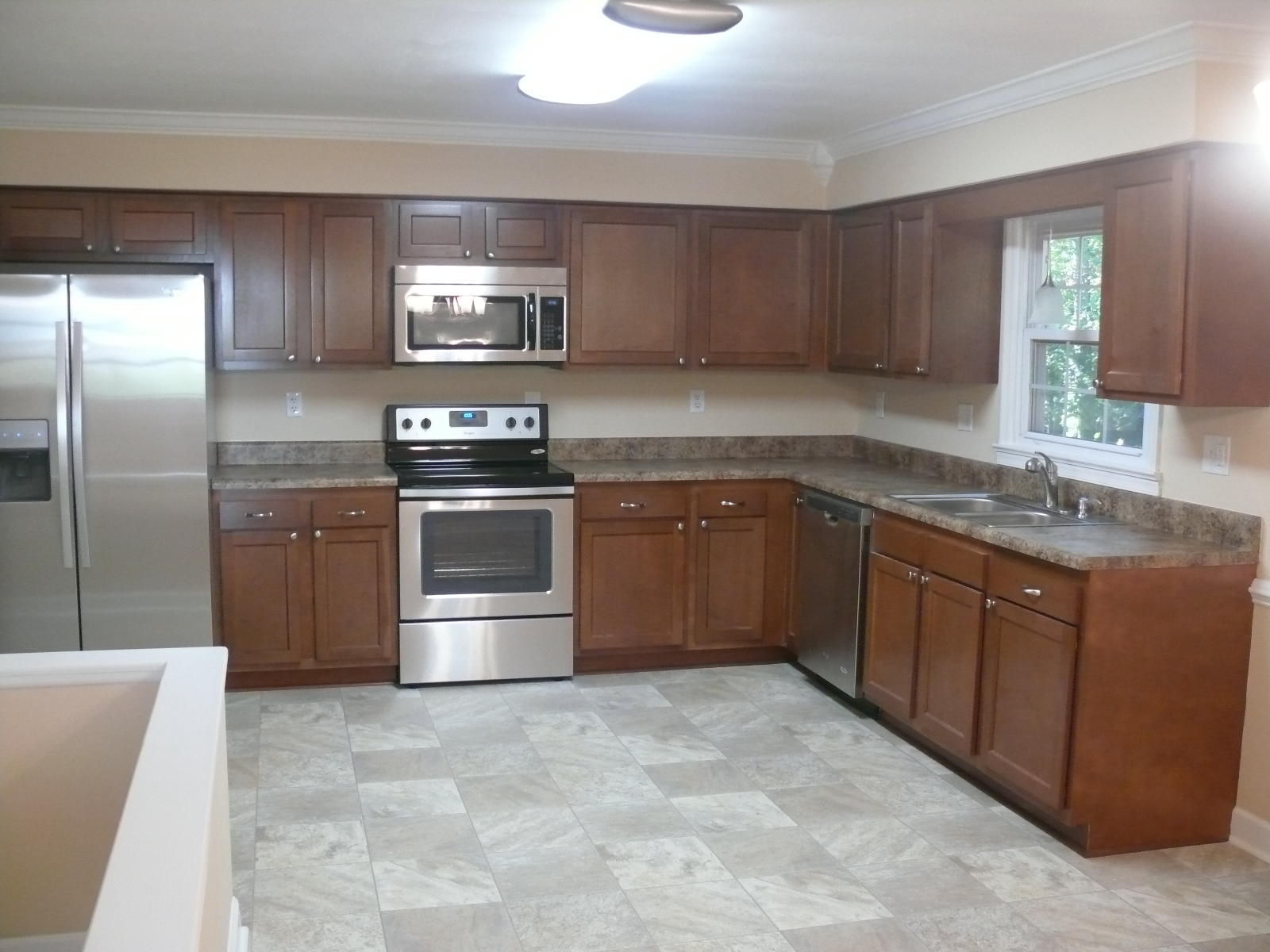 367 Scalybark Drive Blue Ridge, VA 24064 - Photo 8 of 37 a kitchen with stainless steel appliances granite countertop a sink stove and refrigerator