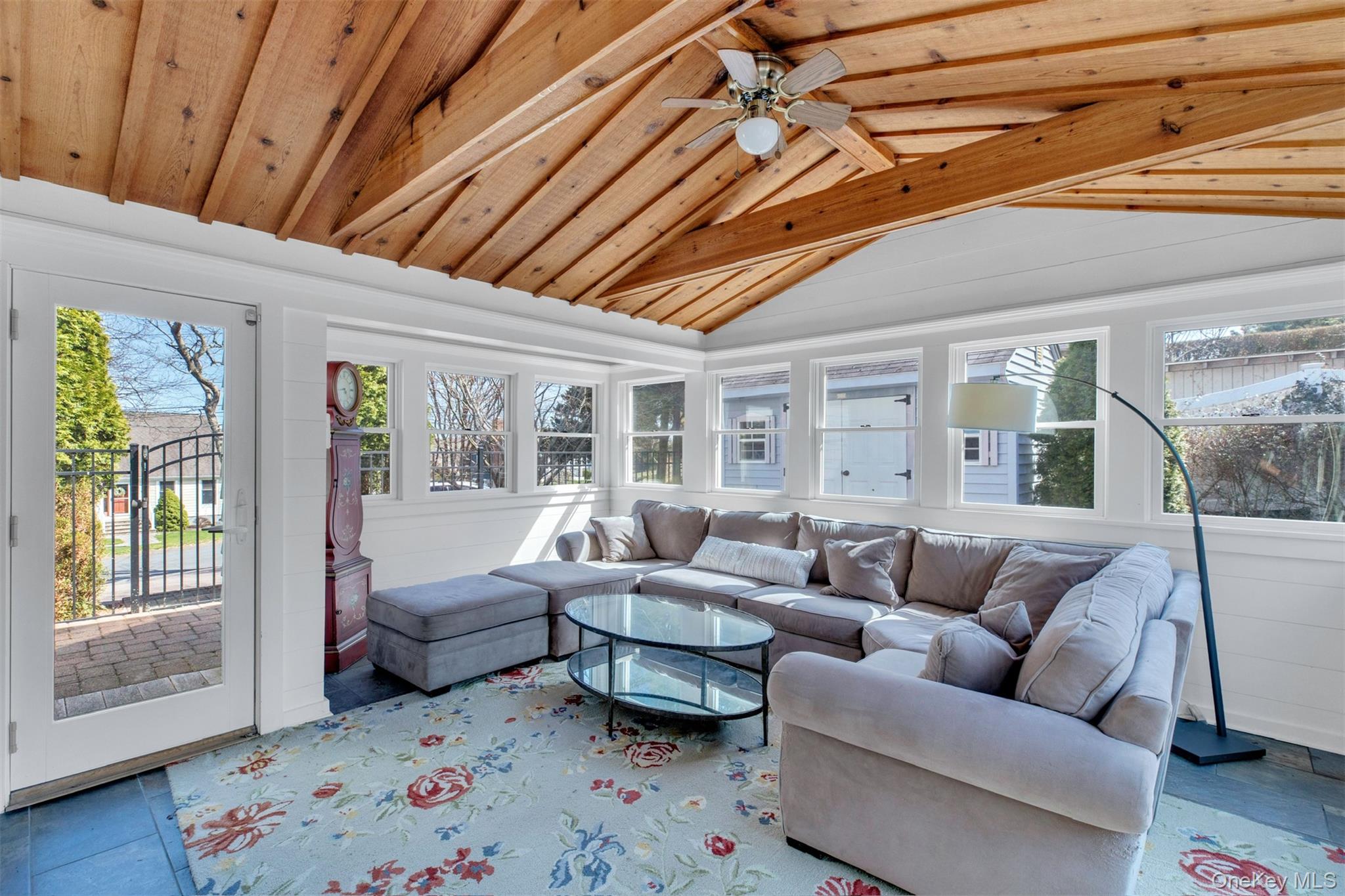 345 Colonial Road Southold, NY 11971 - Photo 15 of 43 a living room with furniture and a couch
