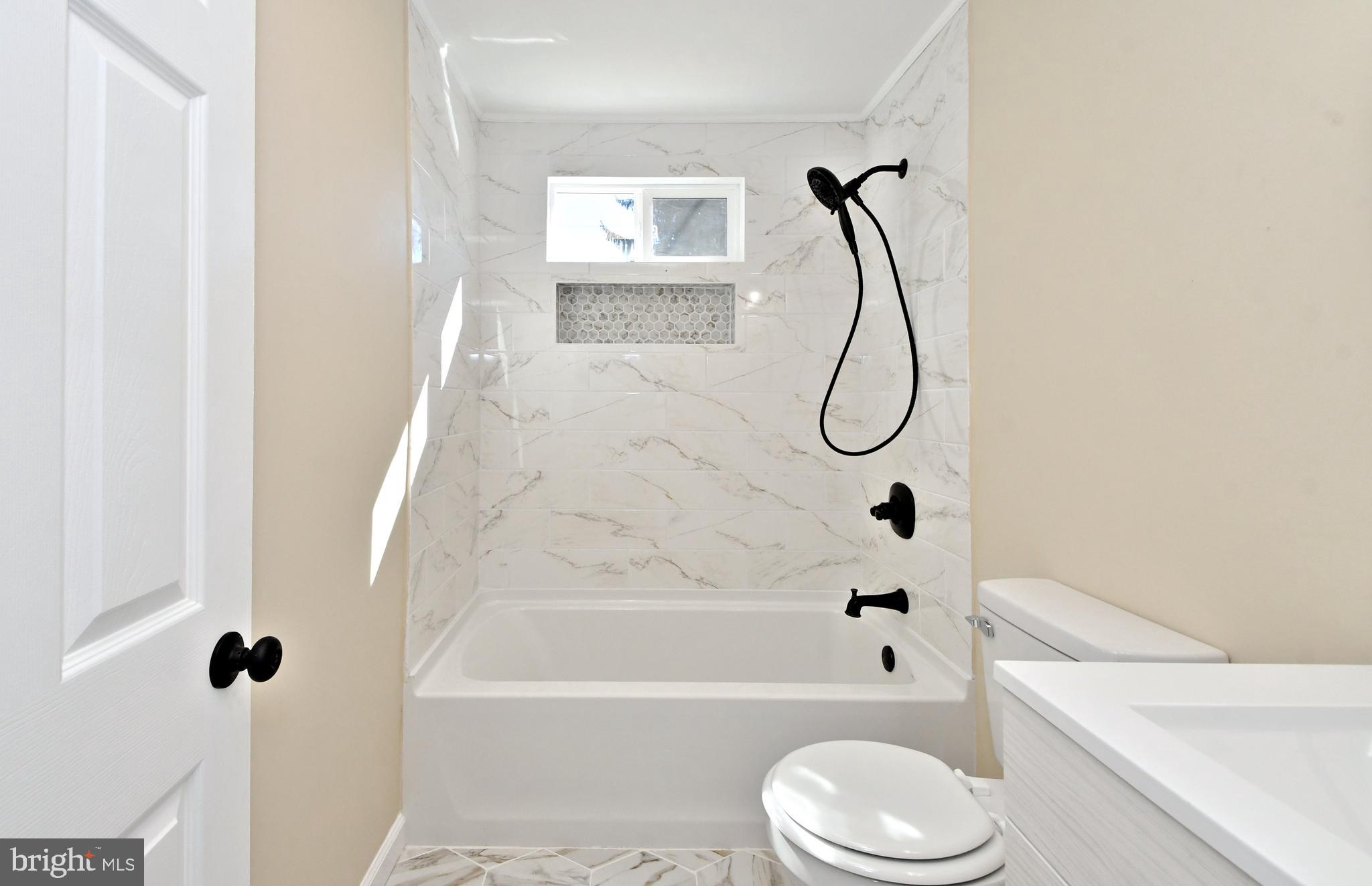 1231 Thomson Road Abington, PA 19001 - Photo 27 of 47 Full Hall Bath with Tile Floor