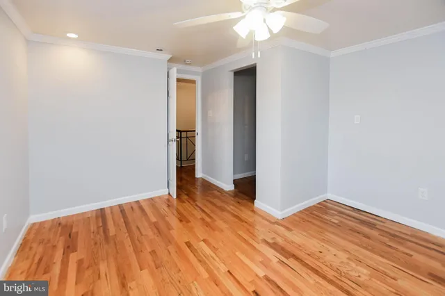 a kitchen with stainless steel appliances granite countertop a sink a stove and cabinets