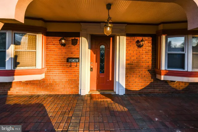 a view of a backyard with large trees