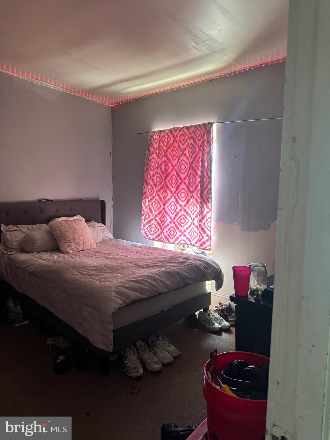 5634 Morton Street Philadelphia, PA 19144 - Photo 20 of 43 a bedroom with a bed and a window