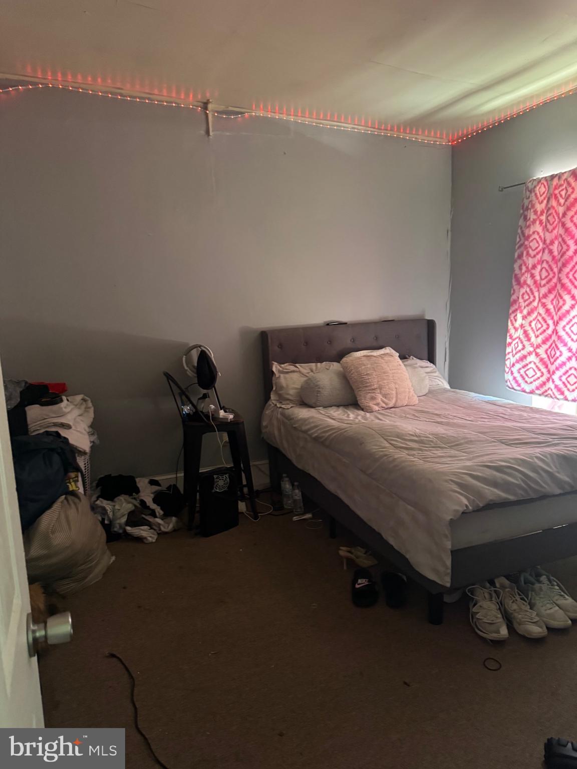 5634 Morton Street Philadelphia, PA 19144 - Photo 21 of 43 a bedroom with a bed and a dresser