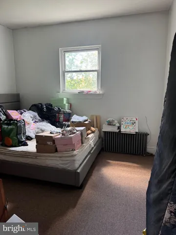 a room with furniture and a fireplace