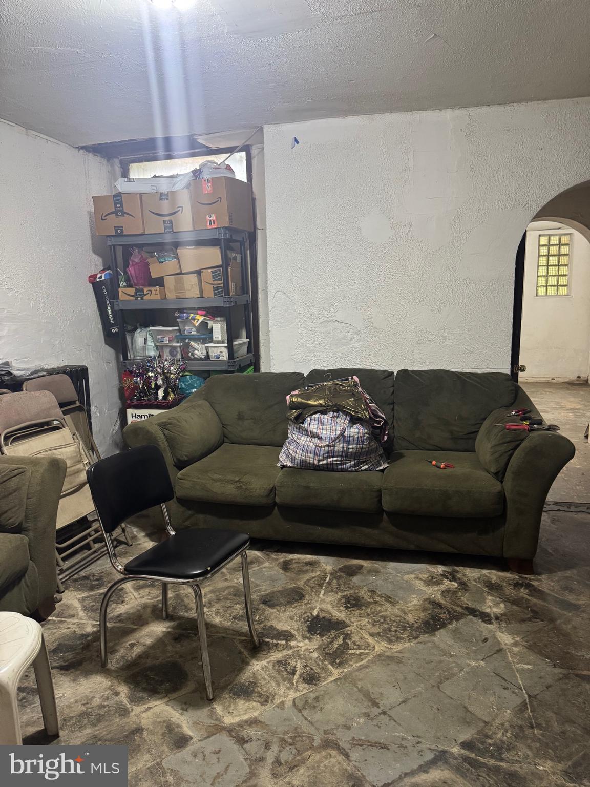 5634 Morton Street Philadelphia, PA 19144 - Photo 32 of 43 a living room with furniture and a ceiling fan